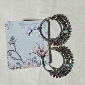 Silver costume pierced earrings. New, no tags